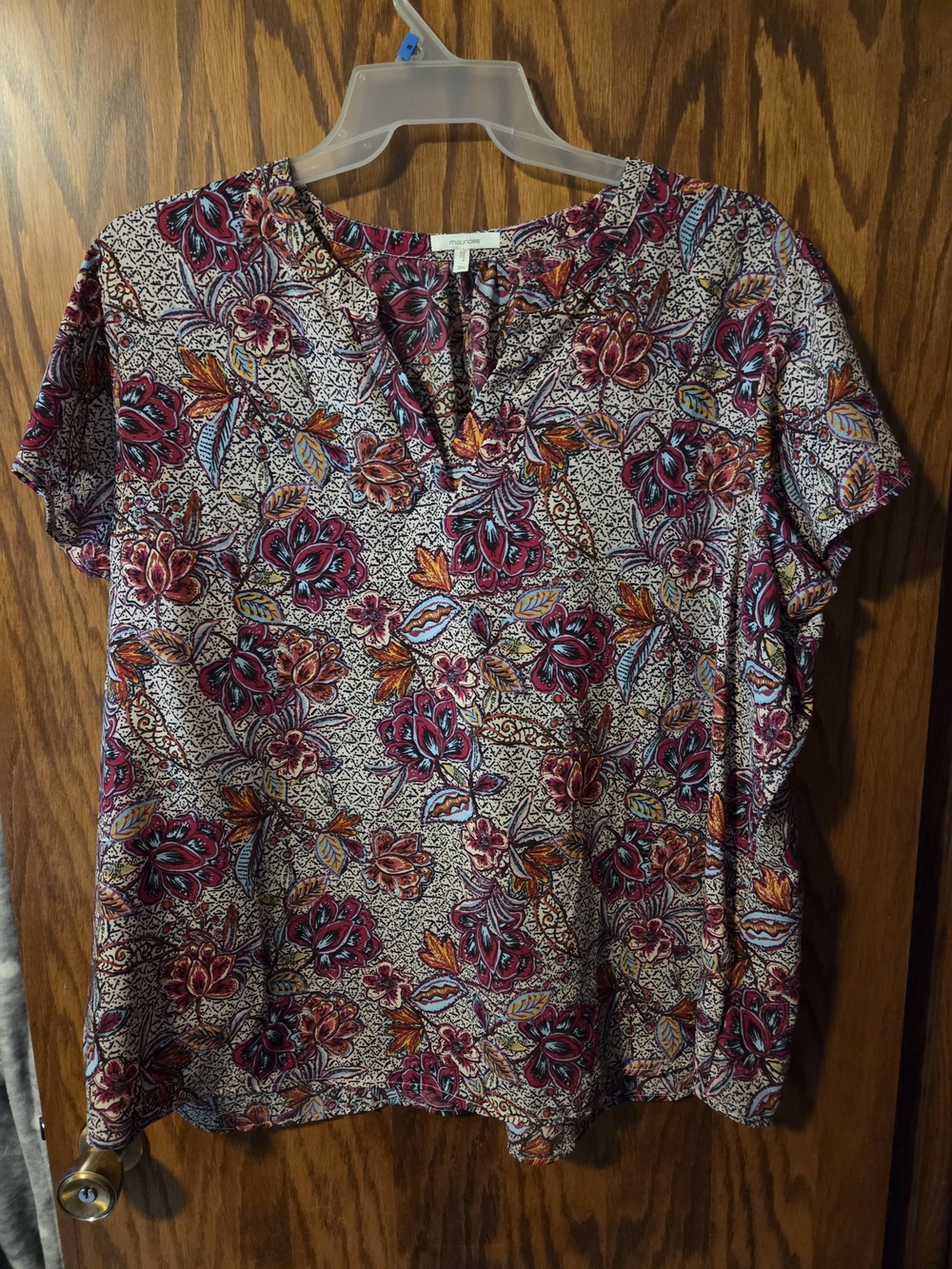 Maurices Floral Short-Sleeve V-Neck Top in Burgundy, Teal, and Orange